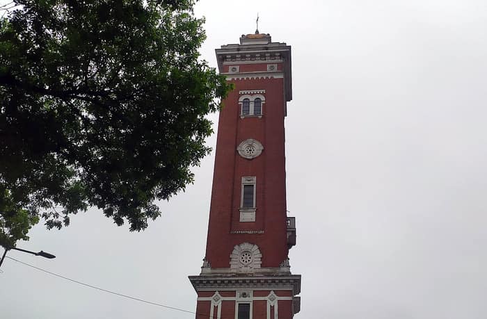The Ader Tower beside a tree